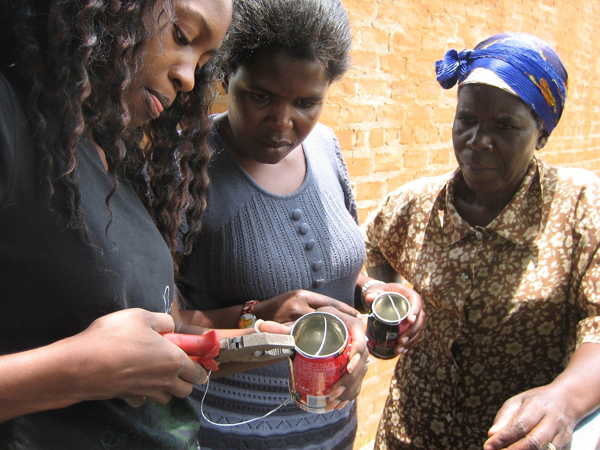 Residents being taught to build low-cost handwashing devices