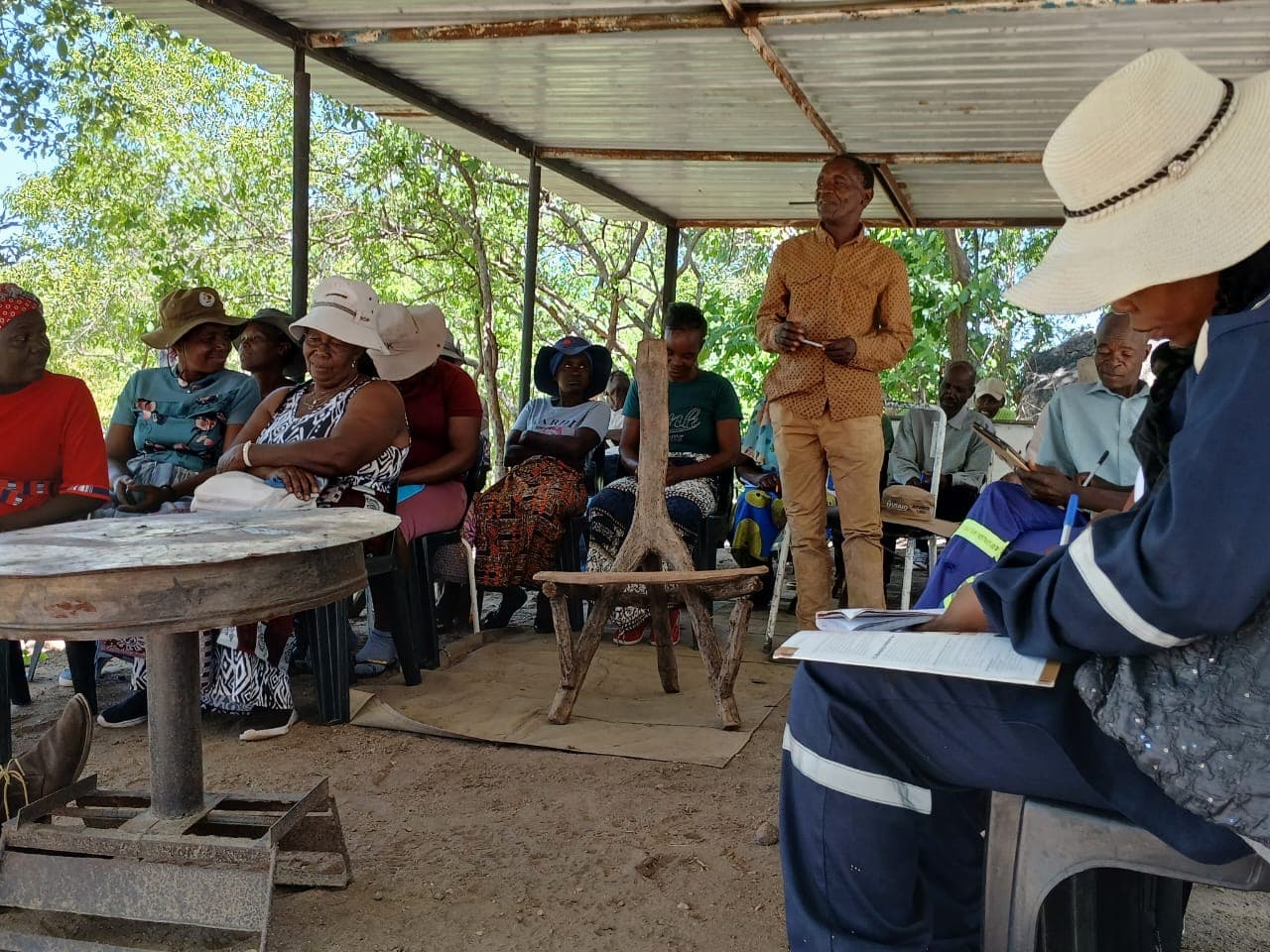 A speaker leading a community discussion
