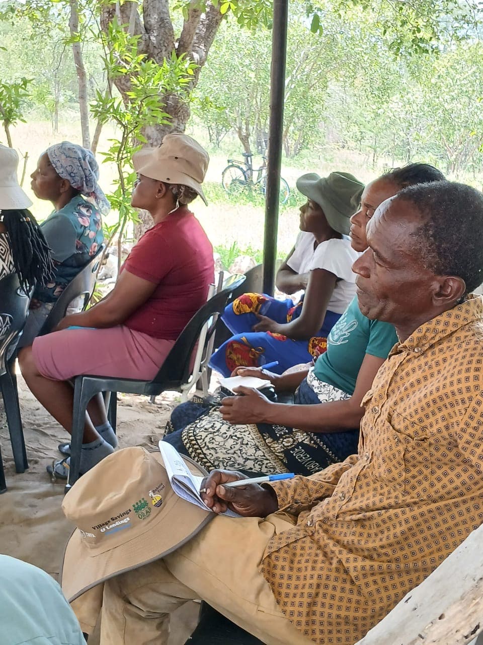 Participants listening during an outdoor discussion