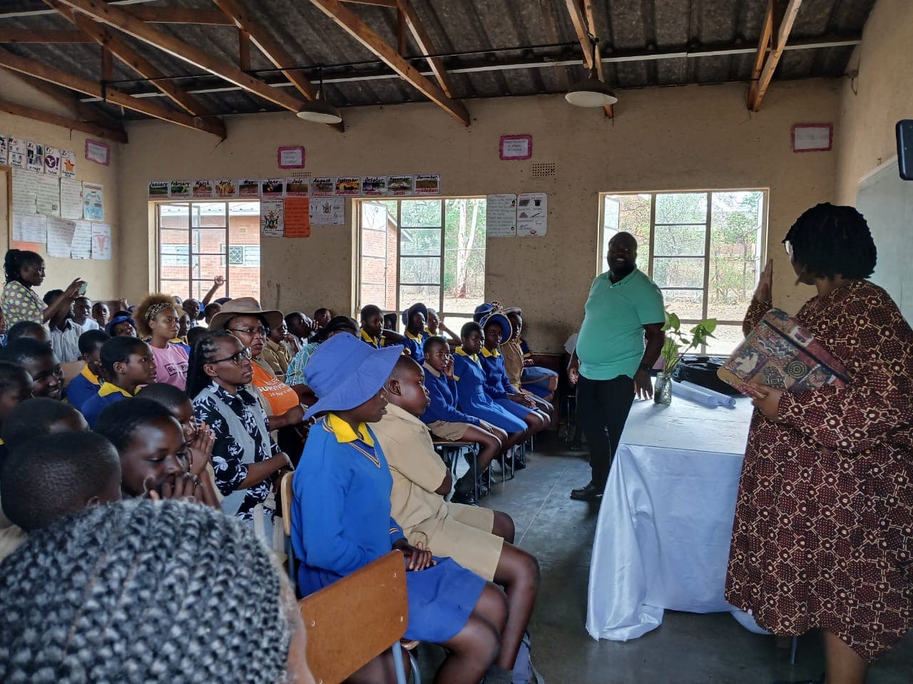 Participants attending an indoor presentation